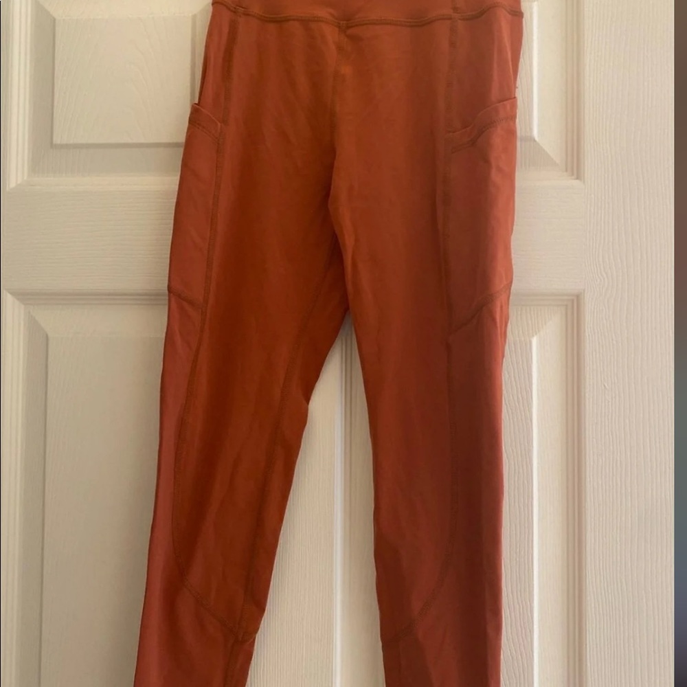 Sz s paragon fitwear leggings. Rust color.